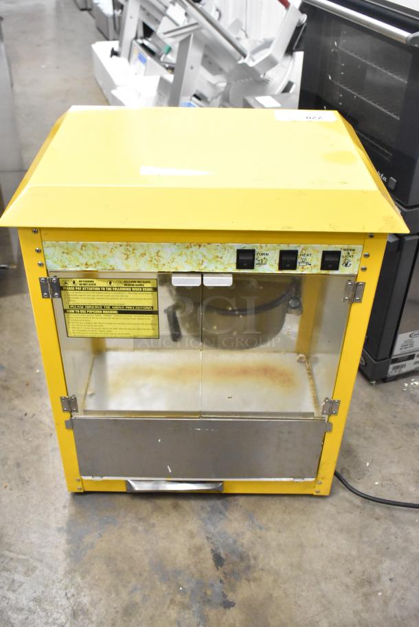 2019 OY-828 Metal Countertop Popcorn Machine and Merchandiser, 110V, 1 Phase, with control switches and instruction label.
