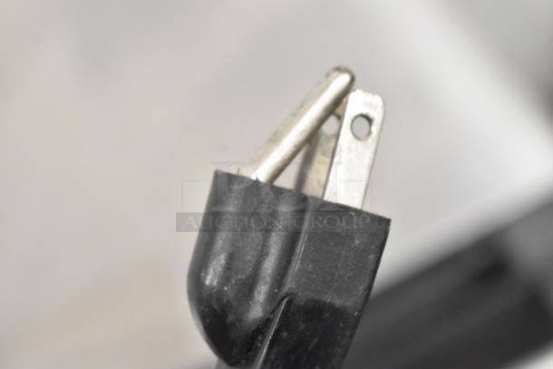 Close-up of the electrical plug for a 2016 Cadco Unox Roberta XAF003 convection oven, 120 volts, single phase.