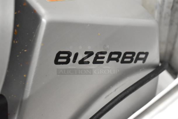 2016 Bizerba GSP HD metal meat slicer, commercial countertop model, 120 volts, visible Bizerba logo, good condition.
