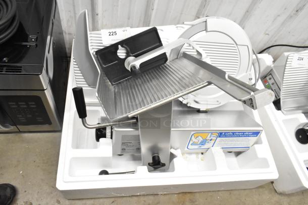 Bizerba GSP HD commercial meat slicer, metal, countertop model, 120V, 1 phase, sturdy build, safety instruction label visible.