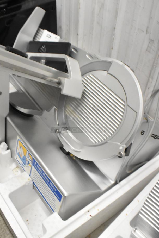Bizerba GSP HD metal meat slicer, commercial countertop model, 120 volts, 1 phase, labeled with safety instructions.