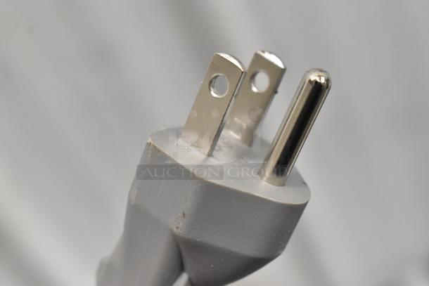 Close-up of a power plug for a 2025 KoolMore KM-MOT-1SS 1.6 cu. ft. stainless steel microwave, 120 Volts, 1 Phase.