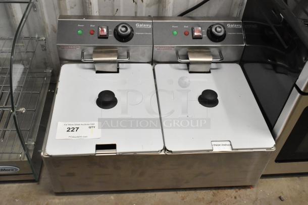 Brand new Galaxy 177EF20E 20 lb. dual tank electric countertop fryer with 2 baskets and lids, 110V, 1 phase, slight scratches.