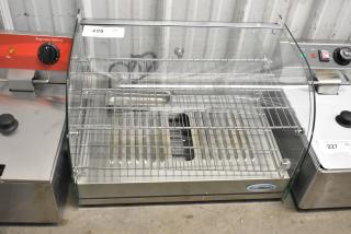 Brand new KoolMore HDC-1.5C curved glass countertop display warmer, 110 volts, 1 phase. Scratch and dent condition.