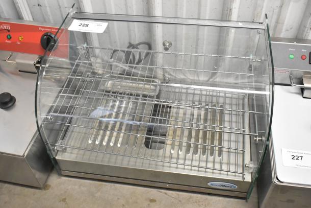 BRAND NEW SCRATCH AND DENT KoolMore HDC-1.5C curved glass countertop display warmer, 110V, 1 phase. Model label visible.