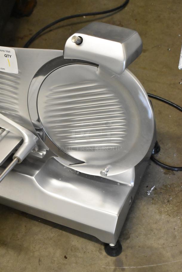 BRAND NEW Globe C10 metal meat slicer with blade sharpener. Countertop model, commercial use, 115V, scratch and dent sale.