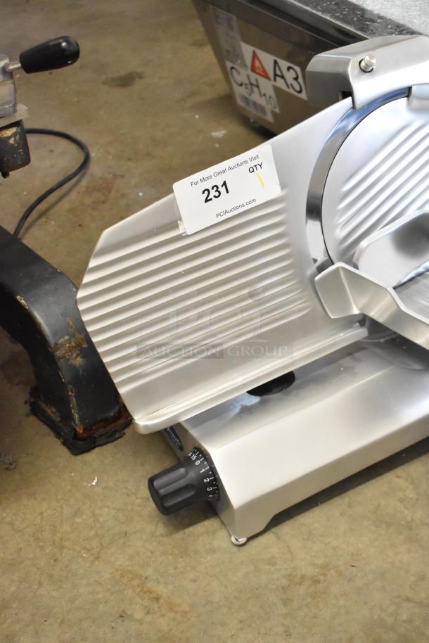 BRAND NEW Globe C10 countertop meat slicer, metal finish, with blade sharpener, 115 Volts, 1 Phase, scratch and dent condition.