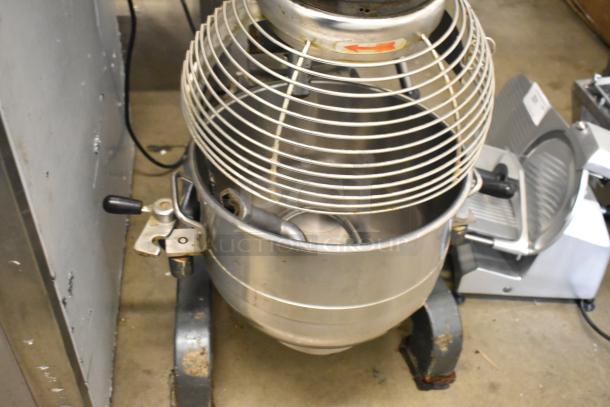 Avantco MX30 30 Quart Planetary Dough Mixer with metal bowl, bowl guard, and dough hook; commercial floor style.