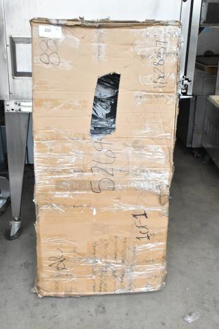 Brand new SereneLife SLFTRD25 treadmill in damaged box marked "Scratch and Dent," sealed and unopened.