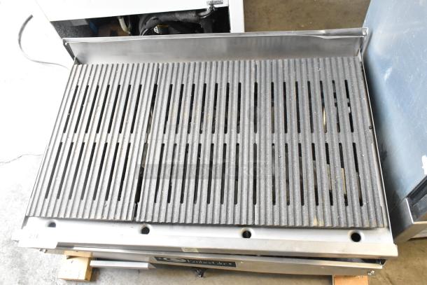 EmberGlo E2424 stainless steel electric charbroiler grill, commercial countertop model. Appears in good condition.