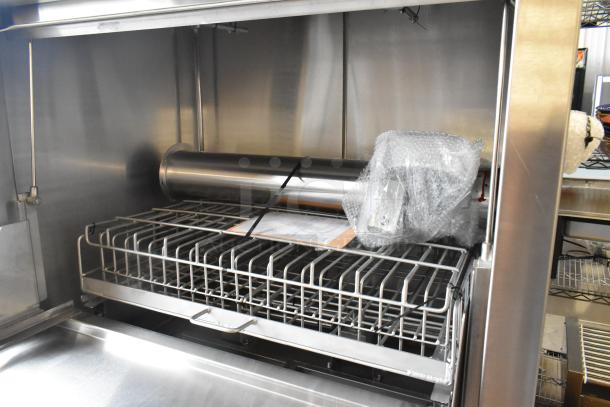Douglas Stainless Steel Commercial Front Load Pot and Pan Washer; interior view, new condition, packaging present.