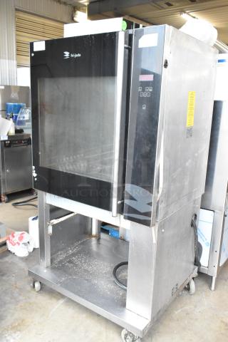 Fri-jado TDR7-P stainless steel electric rotisserie oven, 208V, 3 phase, floor model on casters, control panel visible.