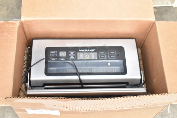 Vacpak-it 186VSM12PRO external vacuum sealer with 12" seal bar. Includes cutter, roll holder. 120 volts, 1 phase, new in box.
