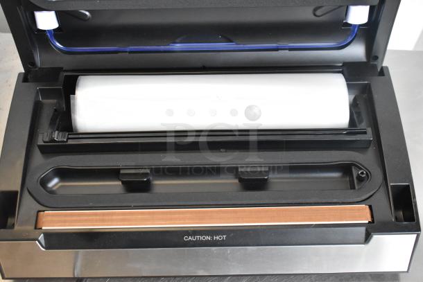 Vacpak-it 186VSM12PRO vacuum sealer with 12" seal bar, cutter, and roll holder, in excellent condition, 120V, 1 Phase.