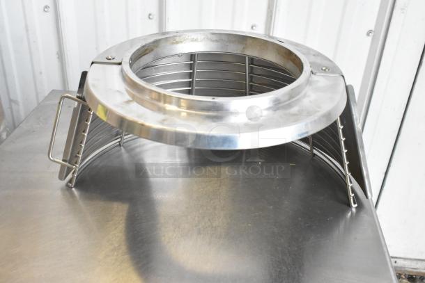 Stainless steel commercial mixing bowl guard with vented design, in good condition; no visible markings or labels.