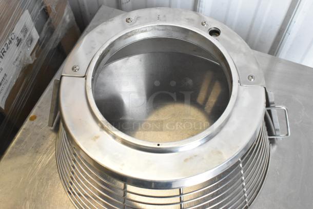 Metal commercial mixing bowl guard, stainless steel, circular design, with visible mounting holes, in good condition.