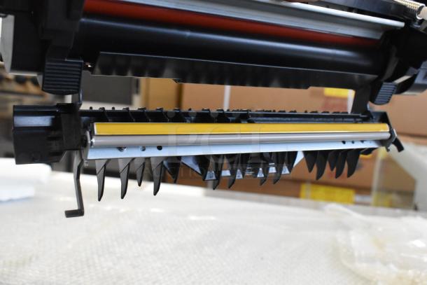 Laser printer cartridge, black casing with a yellow top strip, new condition, suitable for high-capacity printing.