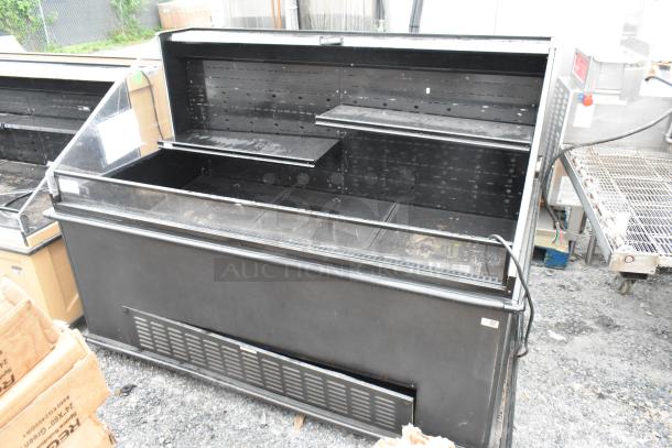 Metal commercial open merchandiser, black finish, 208/230 volts, 1 phase, multi-tiered shelves, used condition.