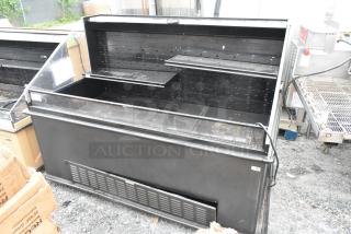 Metal commercial open merchandiser, black finish, 208/230 volts, 1 phase, multi-tiered shelves, used condition.