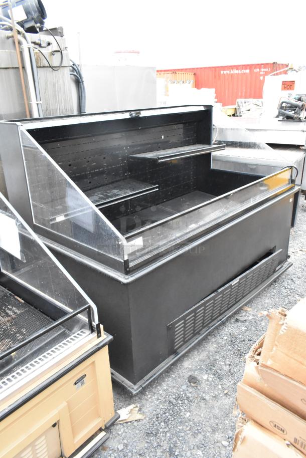 Metal commercial open Grab N Go merchandiser, 208/230 volts, 1 phase, black finish, visible shelving, used condition.