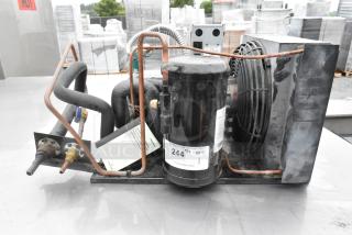 Copeland M4FHCA036-IAA-045 compressor, 115/208-230V, 1-phase, labeled, in used condition.