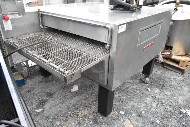 Blodgett MT3855G-G stainless steel conveyor oven, natural gas, single deck, on casters, 150,000 BTU, commercial use.