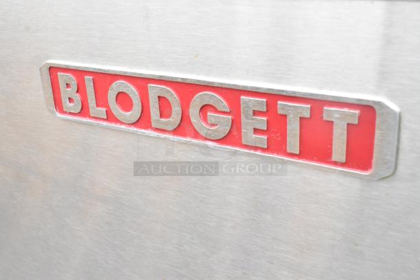 Blodgett MT3855G-G stainless steel commercial conveyor oven, single deck, natural gas, 150,000 BTU, on casters.