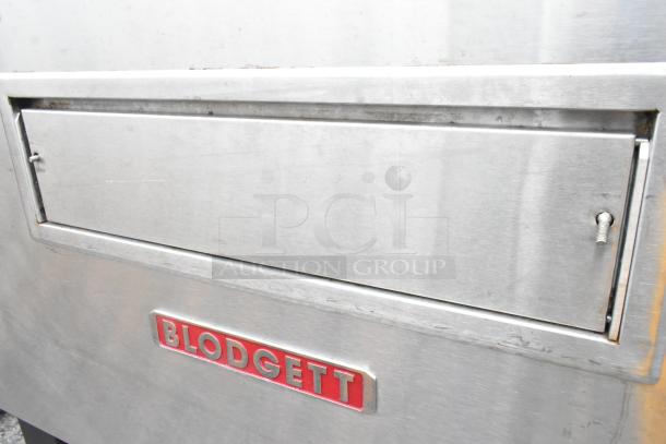 Blodgett MT3855G-G stainless steel single deck conveyor oven, natural gas, 150,000 BTU, on casters, logo on front.