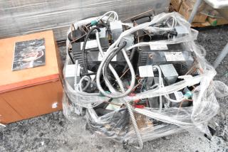 Four commercial compressors including Copeland M4FHC050-CAV-045 and M6CMC0038-IAV-040, wrapped in plastic with visible labels.