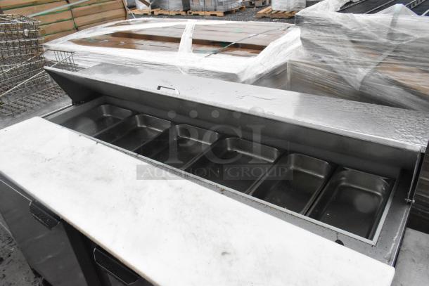 Beverage Air SPE60-16 stainless steel commercial prep table with six compartments, Bain Marie top, and casters. 115V, 1 phase.