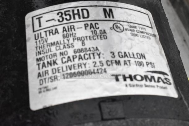 Thomas T-35HD M Ultra Air Pac Air Compressor, 115V, 1 Phase. Features 3-gallon tank, 2.5 CFM at 100 PSI. Label visible.