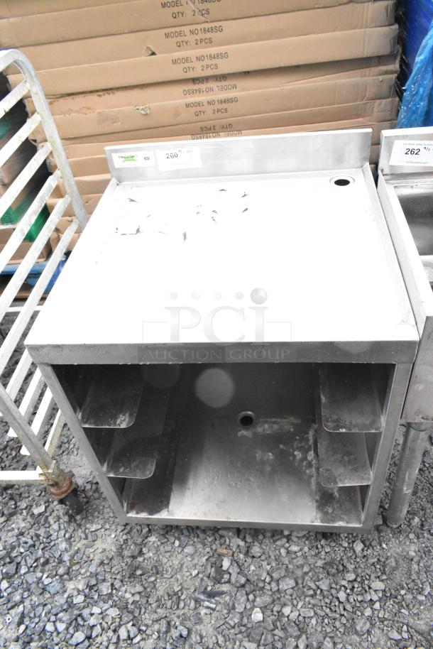 Regency 600GRSU2324C stainless steel drain board, slightly worn, features a flat surface with ridges, includes labels and shelving.