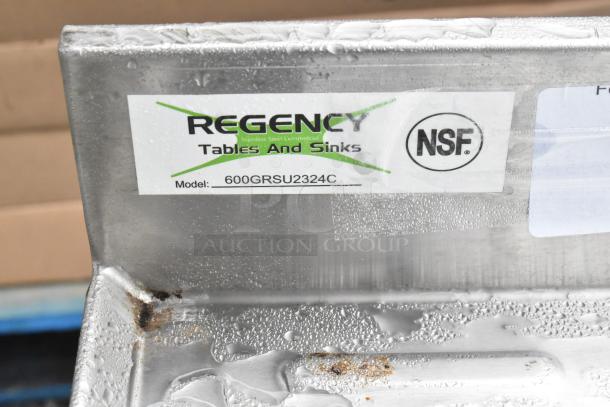 Regency 600GRSU2324C stainless steel drain board, NSF certified, visible model label, slight rust marks, good condition.