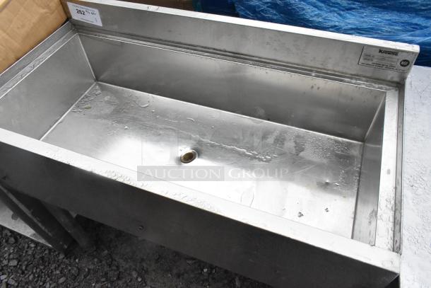 Krowne 1880-36 stainless steel ice bin in fair condition, visible drain, with manufacturer's label. Ideal for commercial use.