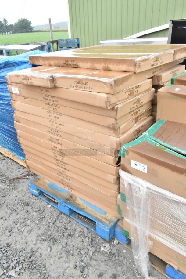 Boxes of 2 Quantum Storage galvanized steel solid shelves, model 1848SG, scratch and dent, stacked on pallets.