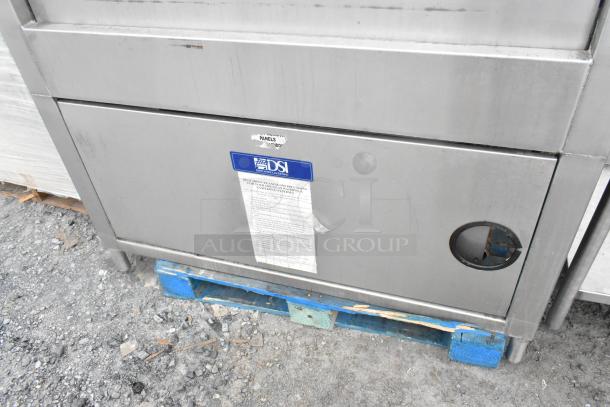 DSI SD20-3-480/3 stainless steel front load pot and pan washer, commercial-grade, visible DSI label, used condition.