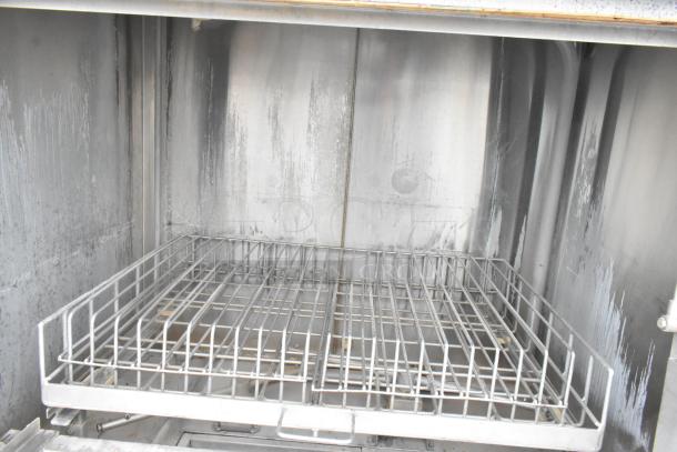 DSI SD20-3-480/3 stainless steel front load pot and pan washer, interior view, showing rack and clean condition.