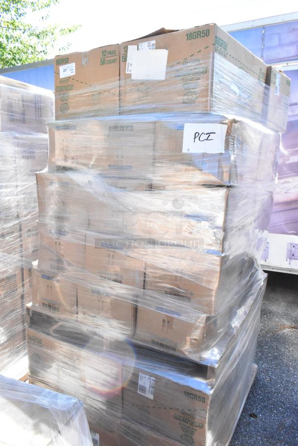 52 boxes of Dart 18GR50 plastic party cups, packed and wrapped on a pallet. Boxes are labeled with item codes.