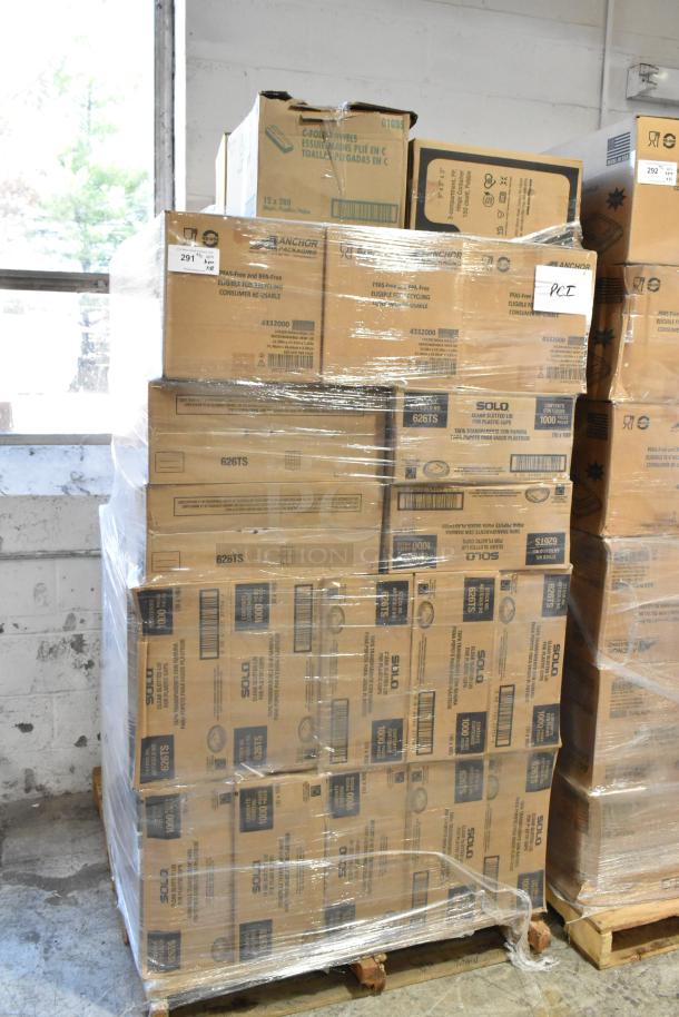 Boxes of Solo 626TS lids, Eco EP-PCLID lids, Swan towels, Anchor 4332000 lids on a pallet. Brand new scratch and dent.