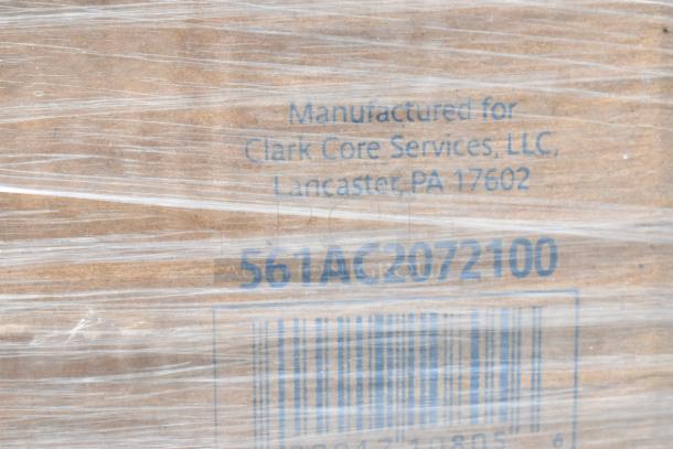 Packaging with transparent wrap showing "Manufactured for Clark Core Services, LLC, Lancaster, PA 17602."