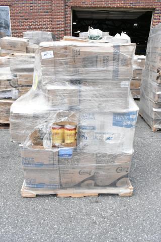 Pallet of 27 assorted brand new scratch-and-dent items, including towels, bakery boxes, cups, and napkins, wrapped for auction.