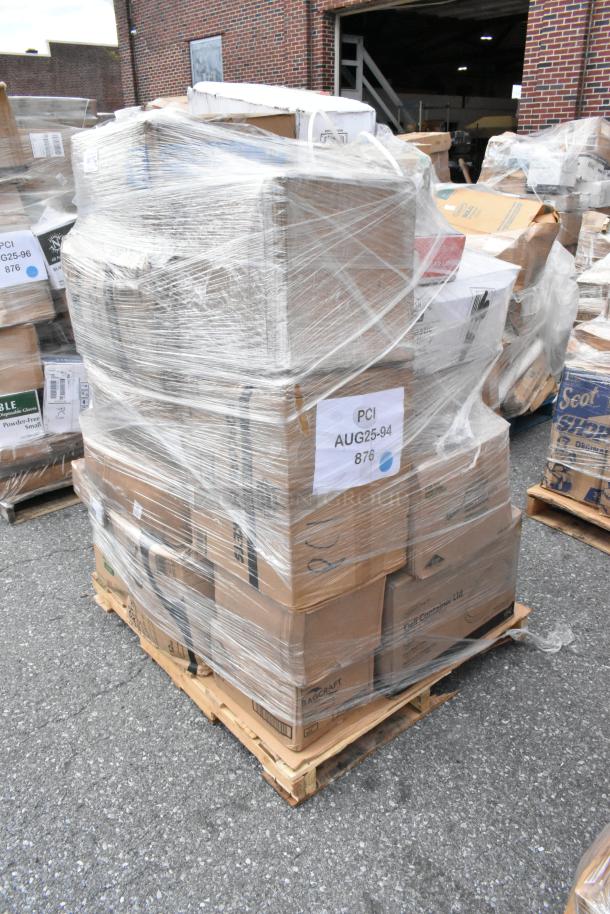 Skid of 32 brand new scratch and dent items wrapped in plastic, including bags, cups, wrap sheets, and towels. Marked "PCI AUG25-94 876."