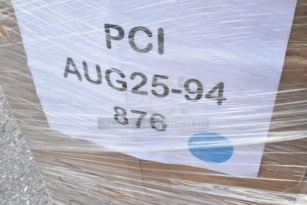 Plastic-wrapped pallet labeled "PCI AUG25-94 876" with new scratch and dent items, including bags, cups, and towels.