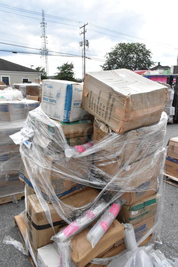 Assorted scratch and dent items on a pallet, including popcorn cups, ice bags, and wrapped in plastic. Mixed condition.