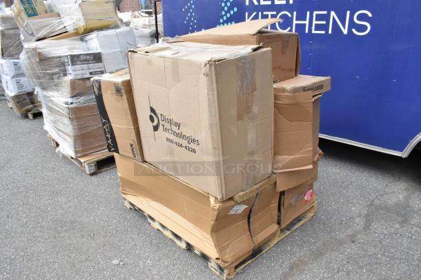 Pallet with multiple boxes, some labeled "Display Technologies." Items include organizer and tabletop. New scratch and dent condition.