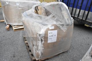 Pallet of mixed brand new scratch and dent items, wrapped, including cups and boxes. Labels show "872 JUNE 18 -04" and "310 Qty 1."