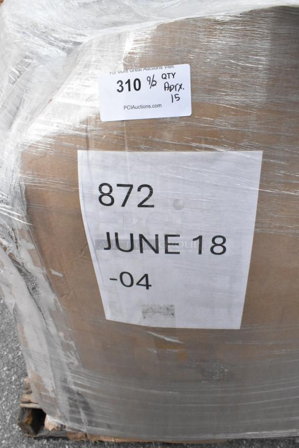 Pallet wrapped with labeled boxes, includes straws, hot cups, grinder, bakery boxes, and containers. Tags show quantity and auction details.