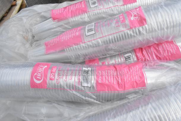 Plastic cups in bulk packaging with pink labels reading "Choice" and "20 oz. Clear PET Plastic Cold Cups - 50 Pack."