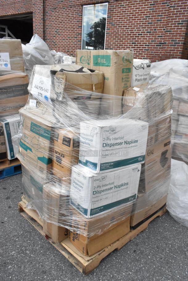Pallet with assorted brand new scratch and dent items, including lids, towels, cold cups, foil pans, and popcorn bags, wrapped in plastic.