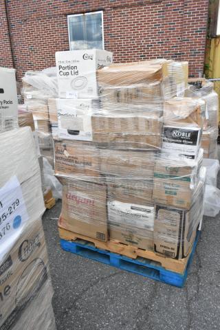 Pallet with 35 new scratch and dent items, including towel rolls, paper plates, cold cups, trash bags, and food trays.